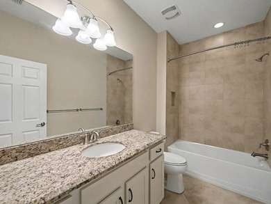 Set on a unique lot with stunning lakefront and preserve views - photo 15