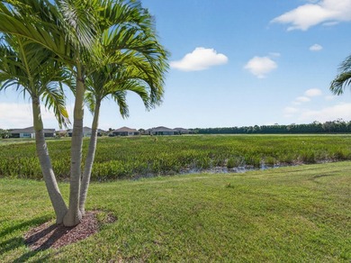 Set on a unique lot with stunning lakefront and preserve views - photo 19
