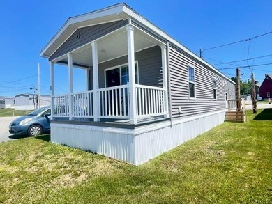 Set on a bright corner lot at the beginning of the community is - photo 2