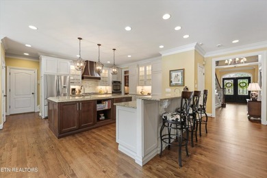 This thoughtfully designed three-story home offers an ideal - photo 5