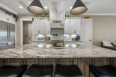 Welcome to an elevated standard of luxury living in the highly - photo 6