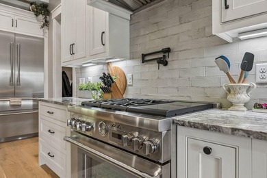 Welcome to an elevated standard of luxury living in the highly - photo 7