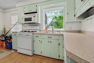 Charming three bedroom one bath Cape Cod with a large fenced in - photo 8