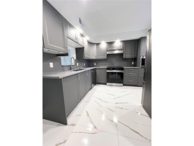 Lake Condo For Sale in Coconut Creek, Florida