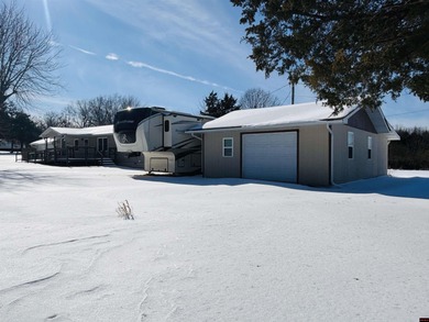 Located just outside of Mountain Home, this well-maintained home