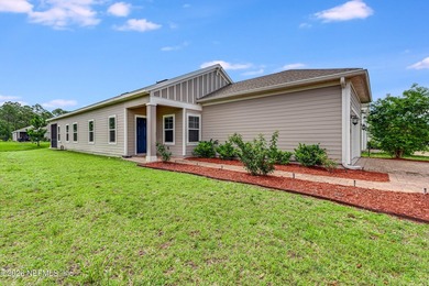 Welcome to this beautifully maintained 4-bedroom, 2.5-bath home - photo 1