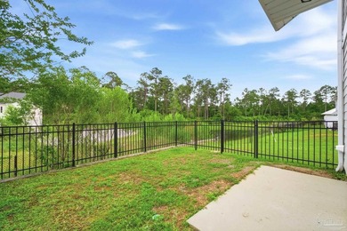 Welcome home to this beautiful end unit townhome in the gated - photo 31