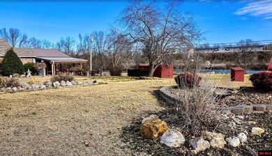 Situated on 3.90 acres m/l within the city limits, this - photo 9