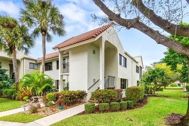 Enjoy serene golf course living in this spectacular second-floor - photo 1