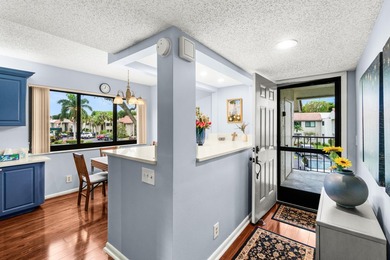 Enjoy serene golf course living in this spectacular second-floor - photo 2