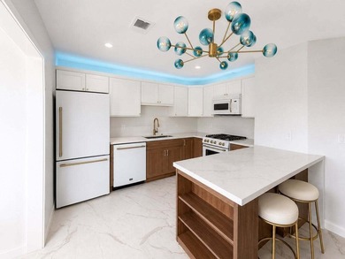 Welcome to effortless lake living in this beautifully updated - photo 3
