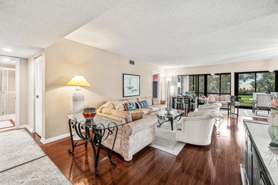 Enjoy serene golf course living in this spectacular second-floor - photo 6