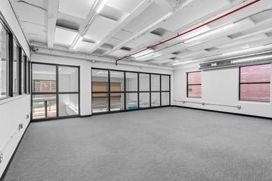 - 15,120 SF: 2 Levels with 21 parking spaces in rear lot - photo 11