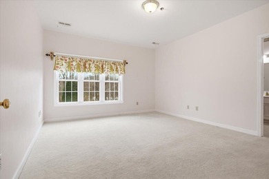 Discover comfort and convenience in this inviting first-floor