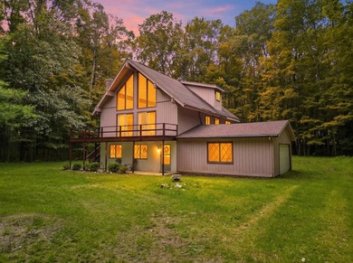 Welcome to this beautifully maintained A-frame in the heart of - photo 30