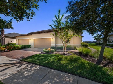 Set on a unique lot with stunning lakefront and preserve views - photo 2