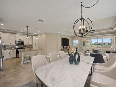 Set on a unique lot with stunning lakefront and preserve views - photo 7