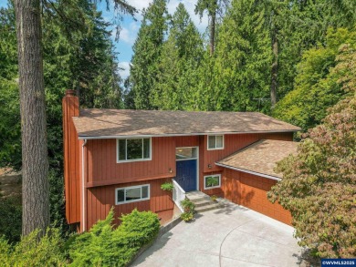 Set on a gorgeous lot just under half-acre in a desirable