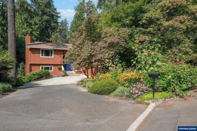 Set on a gorgeous lot just under half-acre in a desirable