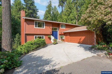 Set on a gorgeous lot just under half-acre in a desirable