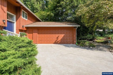 Set on a gorgeous lot just under half-acre in a desirable