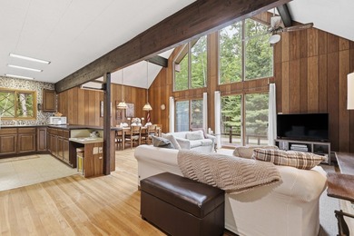 Welcome to this beautifully maintained A-frame in the heart of - photo 5