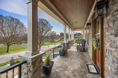 Located in the revered community of Bridgemore, this brick and - photo 3