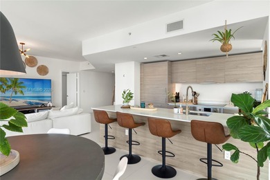 Bright & Spacious 2 bedroom + Den corner unit located in the