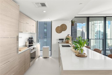 Bright & Spacious 2 bedroom + Den corner unit located in the