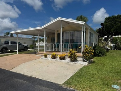 PARADISE AT YOUR FINGERTIPS! This AFFORDABLE home is in the LOW - photo 4