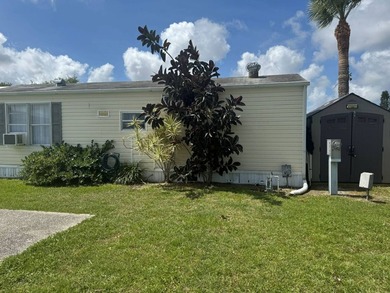 PARADISE AT YOUR FINGERTIPS! This AFFORDABLE home is in the LOW - photo 5