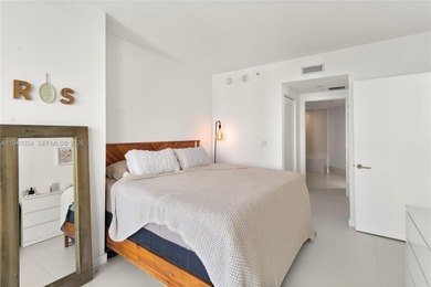 Bright & Spacious 2 bedroom + Den corner unit located in the