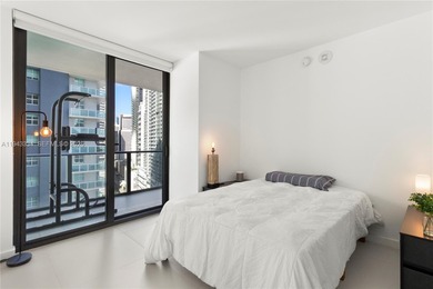 Bright & Spacious 2 bedroom + Den corner unit located in the