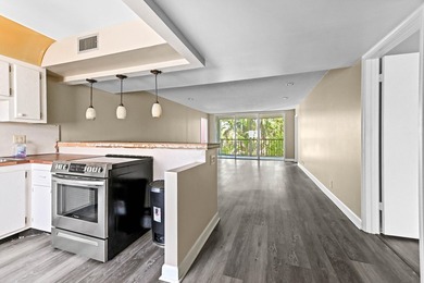 This beautiful condo presents an incredible opportunity for a - photo 2