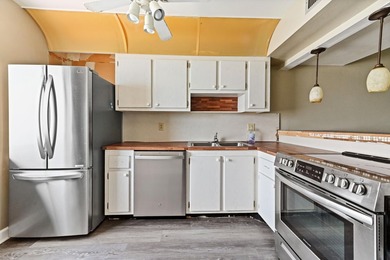 This beautiful condo presents an incredible opportunity for a - photo 3