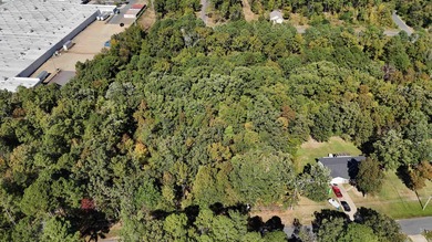 Over 4 acres on Meadowlake Drive. A single family home can be - photo 9