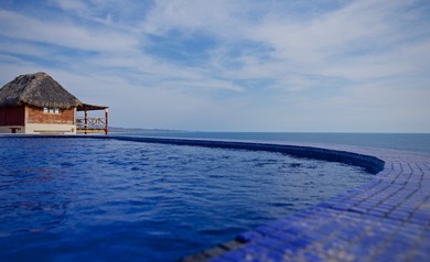 Perched on a dramatic bluff above the Pacific Ocean, MARALUZ is - photo 42
