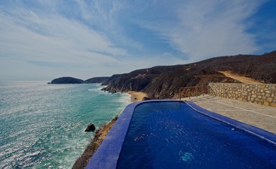 Perched on a dramatic bluff above the Pacific Ocean, MARALUZ is - photo 43