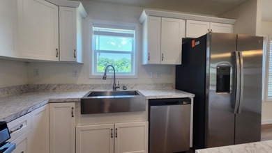 Welcome home to this beautifully designed 3-bedroom, 2-bath home - photo 10