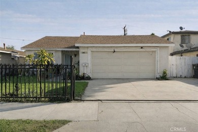 1402 Olive Ave. features 4 bedrooms, 2 bathrooms, a spacious - photo 1