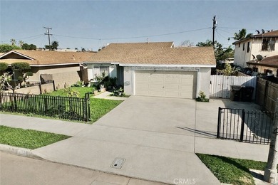 1402 Olive Ave. features 4 bedrooms, 2 bathrooms, a spacious - photo 2