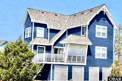 This gem of a home located in the Village at Nags Head is a - photo 2