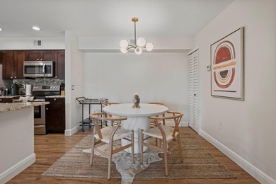 Welcome to this charming two-bedroom, one-bathroom condominium - photo 2