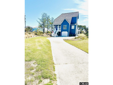 This gem of a home located in the Village at Nags Head is a - photo 3