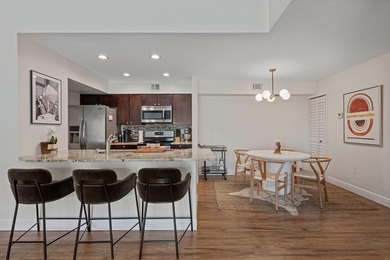 Welcome to this charming two-bedroom, one-bathroom condominium - photo 3