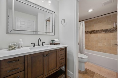 Welcome to this charming two-bedroom, one-bathroom condominium - photo 10
