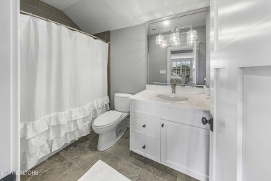 Located in the revered community of Bridgemore, this brick and - photo 33