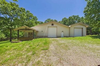 Very cool red iron shop barndominium on 3.5 ac m/l that joins - photo 2
