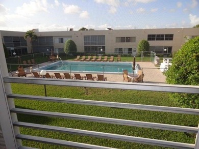 BRIGHT AND SPACIOUS second floor condo, tiled throughout - photo 4