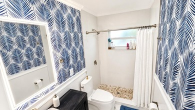 Welcome home to this beautifully upgraded villa in a peaceful - photo 5